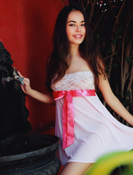 Sexy Li Moon wears a dress with a see-through front