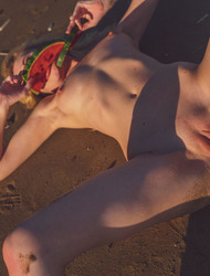 Hot Blonde Angel Sway Frolics On The Beach, Her Sexy Orange Bikini Offering A Tempting View Of Cleavage And Cameltoe