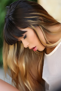 Mona Kim Strips Away Her Tiny Attire